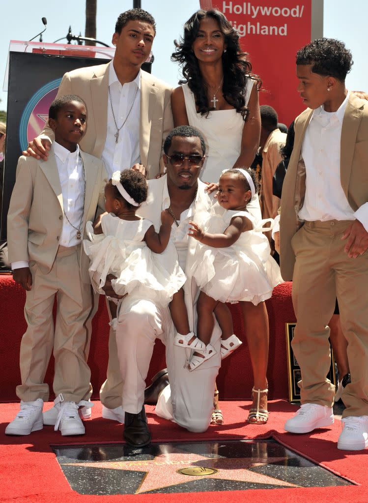 Diddy in 2008 with Kim Porter, sons Christian (from lett), Quincy and Justin and twin girls Jessie and D’Lila. AFP/Getty Images