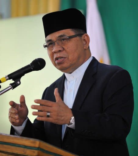Murad Ebrahim, chairman of the Moro Islamic Liberation Front (MILF), speaks during a press conference inside their base at Camp Darapan, Sultan Kudarat province, on the southern Philippine island of Mindanao. Muslim rebels waging a decades-long insurgency in the Philippines said Monday they would refuse to hold direct talks with the government until it modified its roadmap for peace