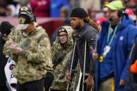 Washington Football Team defensive end Chase Young uses crutches on the sideline during the second half of an NFL football game against the Tampa Bay Buccaneers, Sunday, Nov. 14, 2021, in Landover, Md. (AP Photo/Nick Wass)