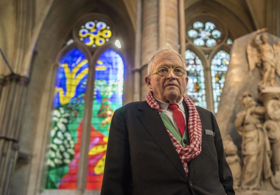 David Hockney in front of The Queen's Window, a stained glass window at Westminster Abbey he designed (PA)