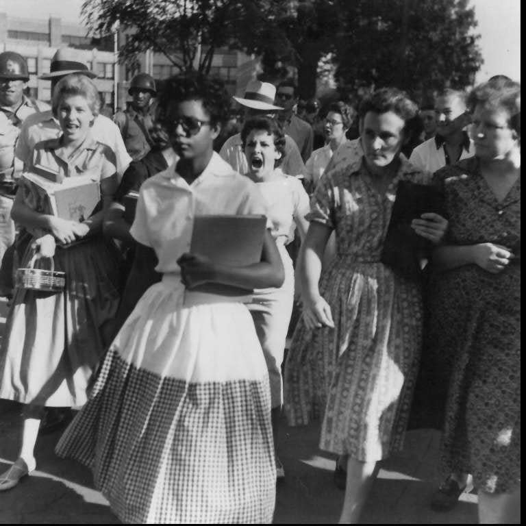 White students and adults harass Elizabeth Eckford, one of nine Black students attempting to attend Central High School in Little Rock, Ark., on Sept. 4, 1957.