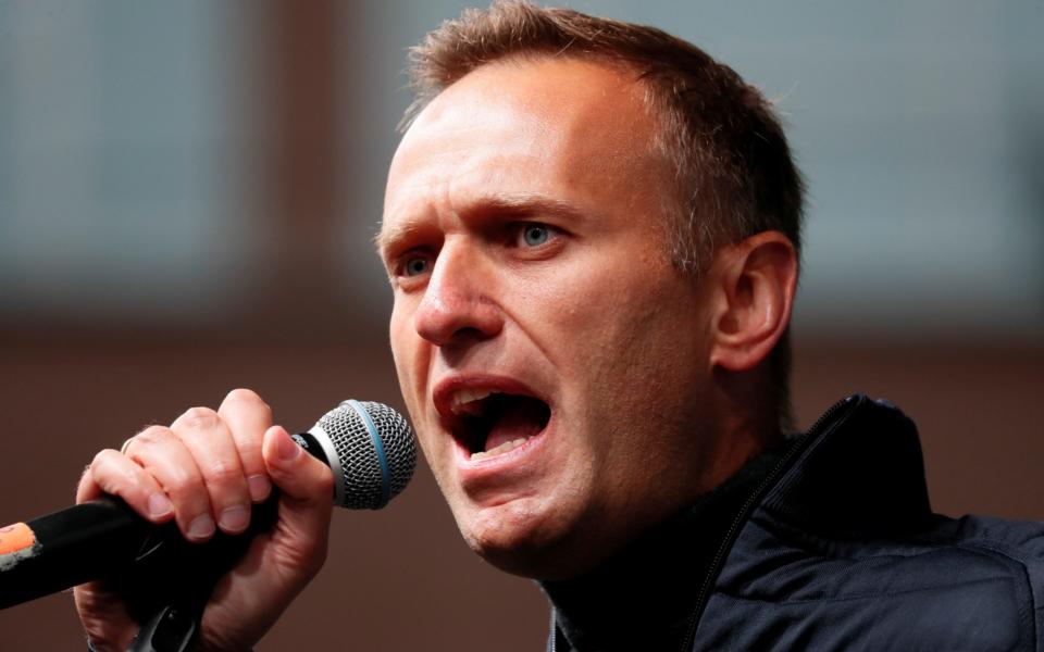 FILE PHOTO: Russian opposition leader Alexei Navalny delivers a speech during a rally to demand the release of jailed protesters, who were detained during opposition demonstrations for fair elections, in Moscow, Russia September 29, 2019. REUTERS/Shamil Zhumatov/File Photo - Shamil Zhumatov/REUTERS