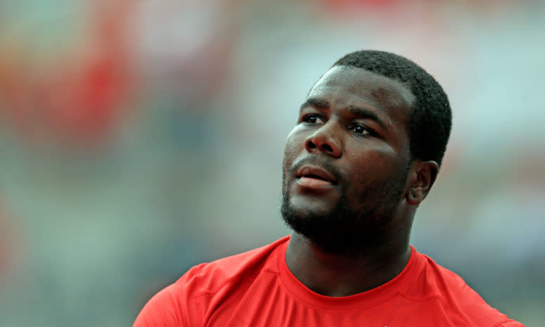 A closeup of Cardale Jones warming up for an Ohio State football game.