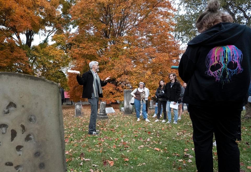 Otterbein University philosophy professor Andrew Mills teaches a "philosophy of death" course and uses a cemetery visit as a teaching tool.