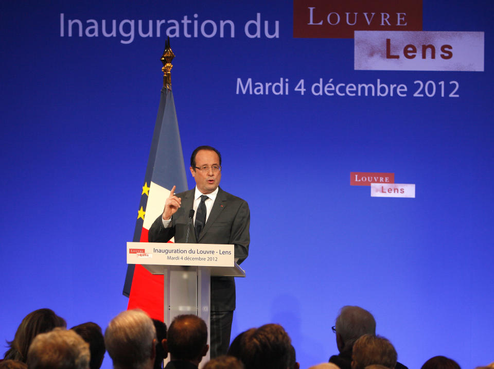 France's President Francois Hollande deliveers a speech during the inauguration of the Louvre Museum in Lens, northern France, Tuesday, Dec. 4, 2012. The museum in Lens is to open on Dec. 12, as part of a strategy to spread art beyond the traditional bastions of culture in Paris to new audiences in the provinces. (AP Photo/Michel Spingler, Pool)