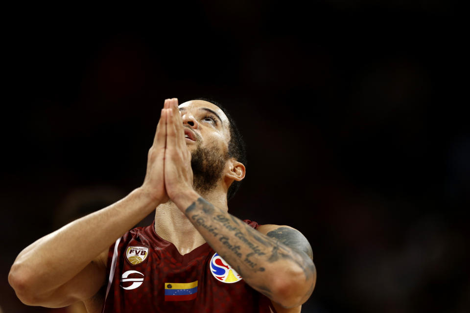 Heissler Guillent of Venezuela reacts during the final moments of their victory over China in their group phase game in the FIBA Basketball World Cup at the Cadillac Arena in Beijing, Wednesday, Sept. 4, 2019. (AP Photo/Mark Schiefelbein)