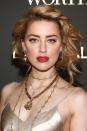 <p>Make a statement by coping Amber Heard's wind-blown waves and festive make-up. To recreate the actress' curls, apply Oribe's <a rel="nofollow noopener" href="https://www.spacenk.com/uk/en_GB/haircare/styling/hair-cream/matte-waves-texture-lotion-UK200017591.html?" target="_blank" data-ylk="slk:Texture Lotion;elm:context_link;itc:0;sec:content-canvas" class="link ">Texture Lotion</a> to damp hair, before twisting dried tresses around Ghd's <a rel="nofollow noopener" href="http://www.selfridges.com/GB/en/cat/ghd-curve-long-lasting-curling-wand-gift-set_403-3001557-PC023K218CROWGA/?" target="_blank" data-ylk="slk:Creative Curl Wand;elm:context_link;itc:0;sec:content-canvas" class="link ">Creative Curl Wand</a>. Then, scrunch Aveda's <a rel="nofollow noopener" href="https://www.aveda.co.uk/product/17769/51018/styling/tonic/texture-tonic#/shade/125ml" target="_blank" data-ylk="slk:Texture Tonic;elm:context_link;itc:0;sec:content-canvas" class="link ">Texture Tonic</a> into the lengths and pin them up with Hersheson's <a rel="nofollow noopener" href="https://www.hershesons.com/black-grips-disabled.html?gclid=CjwKCAjwspHaBRBFEiwA0eM3kUGTQUuXqd8T-9qizWr2WWrz1Hp7LZtZrGMmz0U7J3xsaz0A1xZ8EhoC5KEQAvD_BwE" target="_blank" data-ylk="slk:'Get A Grip' Grips;elm:context_link;itc:0;sec:content-canvas" class="link ">'Get A Grip' Grips</a>. For her make-up, choose a pink-red lipstick like Charlotte Tilbury's <a rel="nofollow noopener" href="https://www.charlottetilbury.com/uk/matte-revolution-red-carpet-red.html" target="_blank" data-ylk="slk:Matte Revolution in Red Carpet Red;elm:context_link;itc:0;sec:content-canvas" class="link ">Matte Revolution in Red Carpet Red</a> and add some glitz to your eyes with Stila's <a rel="nofollow noopener" href="https://www.feelunique.com/p/Stila-Glitter-and-Glow-Liquid-Eye-Shadow-Duo-Chrome-Shades-45ml?" target="_blank" data-ylk="slk:Liquid Eyeshadow in Perlina;elm:context_link;itc:0;sec:content-canvas" class="link ">Liquid Eyeshadow in Perlina</a>.</p>