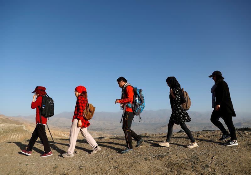 Afghan Hikeventures members walk in mountain on outskirts of Kabul