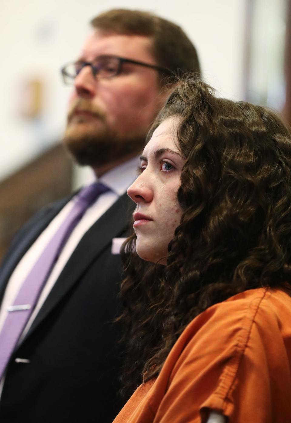 Jillian Ibel and her attorney Wes Buchanan listen to Tina Ibel, Jillian's mother address the court, speak via zoom during the sentencing of Jillian Ibel and Greg Chambers. Ibel and Chambers pleaded guilty to involuntary manslaughter in the death of their 7-week-old daughter Layla.