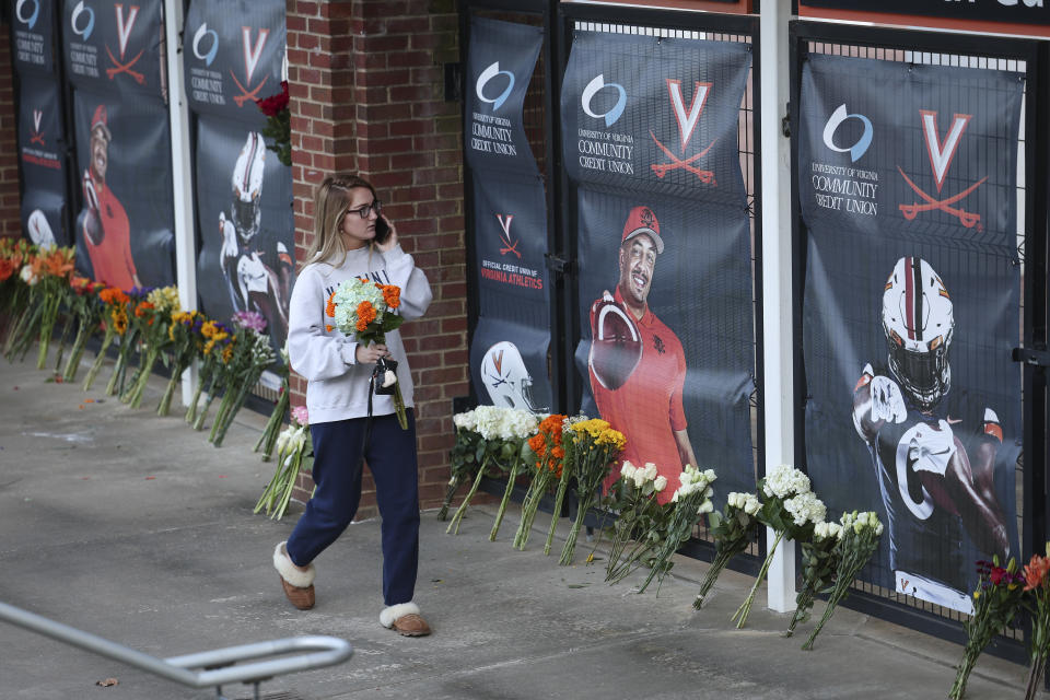 A mourner at a makeshift memorial outside Virginia's Scott Stadium. (Win McNamee/Getty Images)