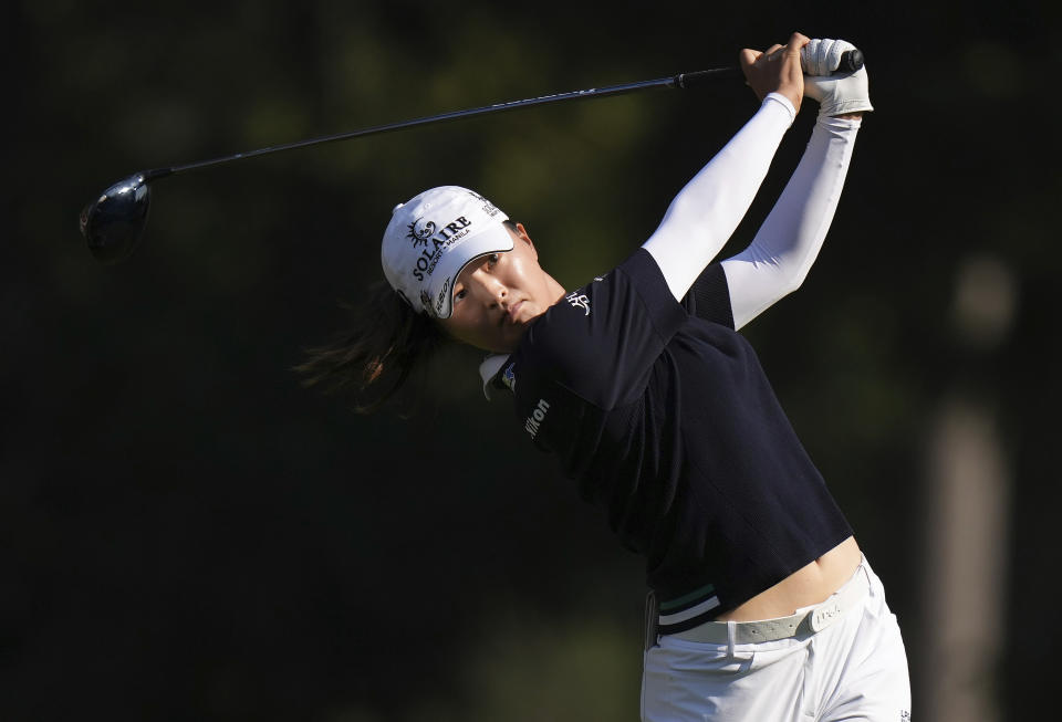 Jin Young Ko, of South Korea, watches her tee shot on the 10th hole during the third round at the LPGA CPKC Canadian Women's Open golf tournament in Vancouver, British Columbia, Saturday, Aug. 26, 2023. (Darryl Dyck/The Canadian Press via AP)