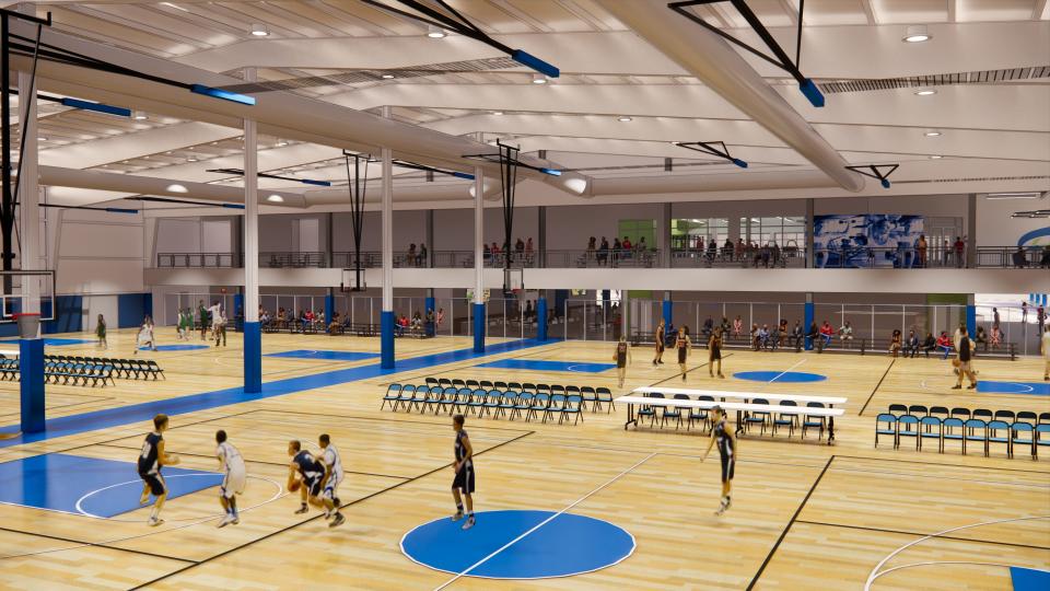 This rendering shows basketball courts, convertible to volleyball courts, in the future Hagerstown Field House. People on the mezzanine level watch the action.