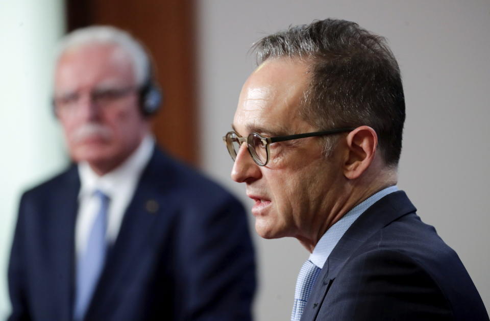 German Foreign Minister Heiko Maas, right, speaks as his Palestine counterpart Riyad al-Maliki, left, listens during a news conference following their meeting, in Berlin, Germany, Tuesday, Nov. 17, 2020. (Hannibal Hanschke/Pool Photo via AP)