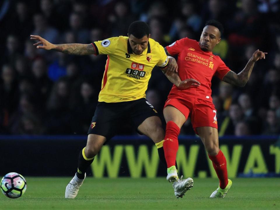 Deeney attempts to hold off Clyne (Getty)