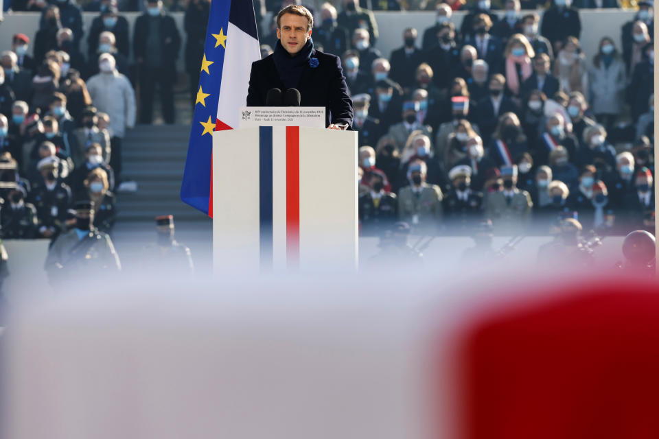 French President Emmanuel Macron delivers his speech by the coffin of Hubert Germain, during ceremonies marking the 103rd anniversary of Armistice Day, Thursday, Nov. 11, 2021 in Paris. Wreath-laying ceremonies will take place across the country, while in Paris there will be a tribute to the last remaining participants in the liberation of France from the Nazis, Hubert Germain, who recently died aged 101. (Ludovic Marin, Pool via AP)