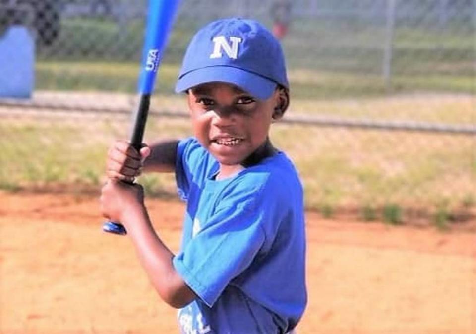 Winston Hunter, 6, was killed when his house was hit by a barrage of gunfire, the solicitor’s office said.