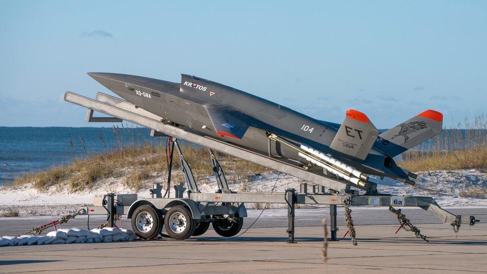 An XQ-58A on its trailer-based launcher at Eglin Air Force Base. <em>USAF</em>