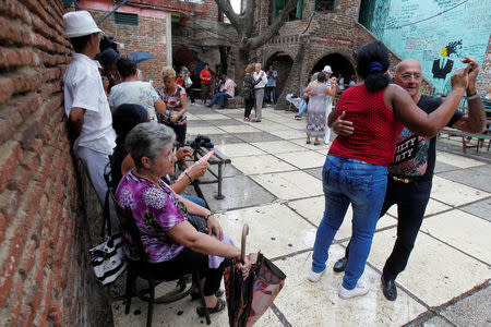 People dance in El Mejunje cultural center in Santa Clara, Cuba, March 10, 2018. Picture taken on March 10, 2018. REUTERS/Stringer