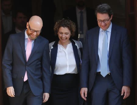 Secretary General of the Christian Democratic Union (CDU) Peter Tauber, Secretary General of the Free Democratic Party (FDP) Nicola Beer and Secretary General of the Christian Social Union in Bavaria (CSU) Andreas Scheuer leave the German Parliamentary Society offices after the round of exploratory talks between CDU/CSU and FDP about forming a new coalition government in Berlin, Germany, October 18, 2017. REUTERS/Hannibal Hanschke