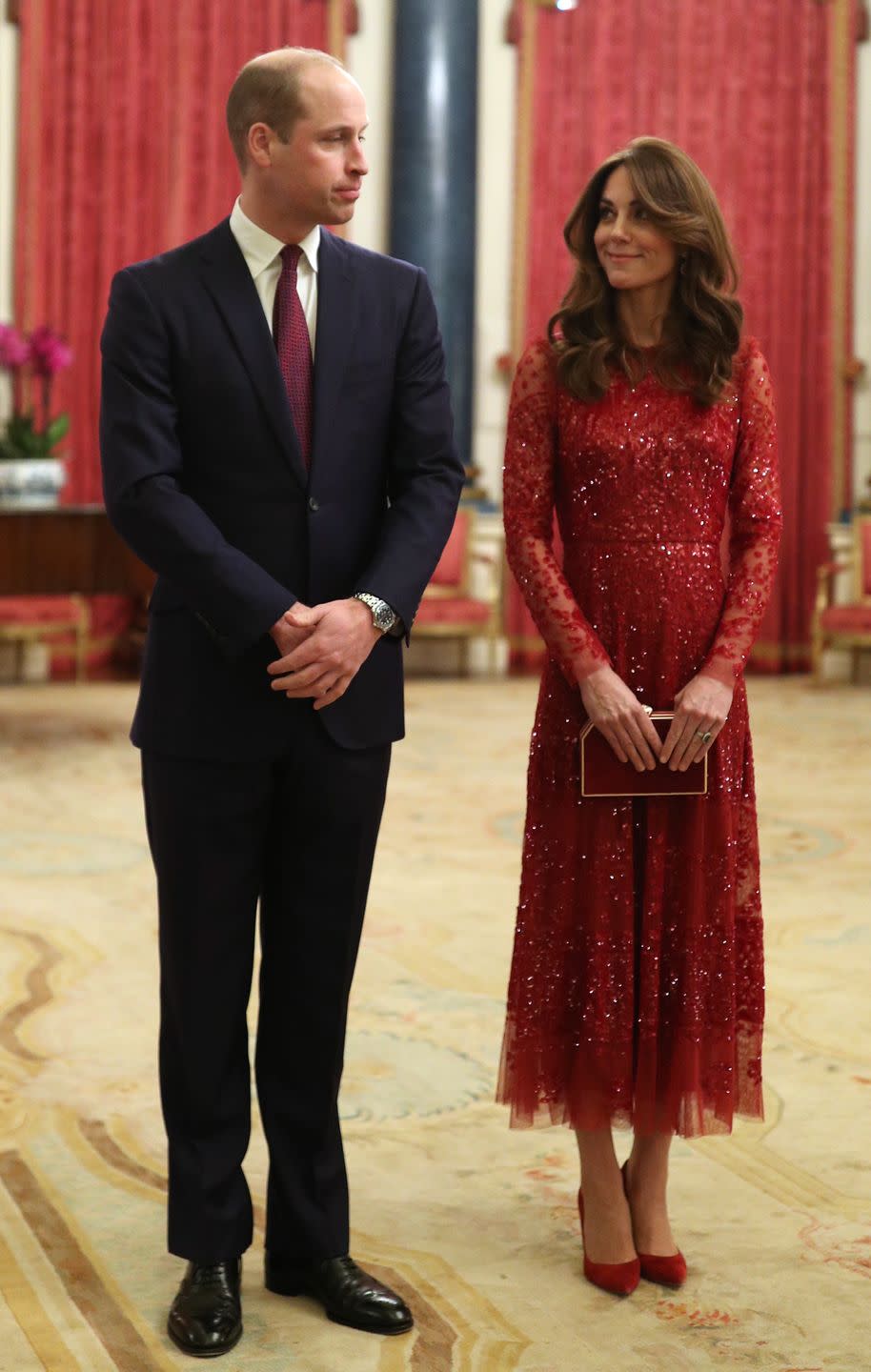 <p>The Duchess of Cambridge attend a reception to mark the UK-Africa Investment Summit at Buckingham Palace. She wore a dress by <a href="https://www.net-a-porter.com/us/en/Shop/Designers/Needle_and_Thread?pn=1&npp=60&image_view=product&dScroll=0" rel="nofollow noopener" target="_blank" data-ylk="slk:Needle & Thread;elm:context_link;itc:0;sec:content-canvas" class="link ">Needle & Thread</a>. </p>