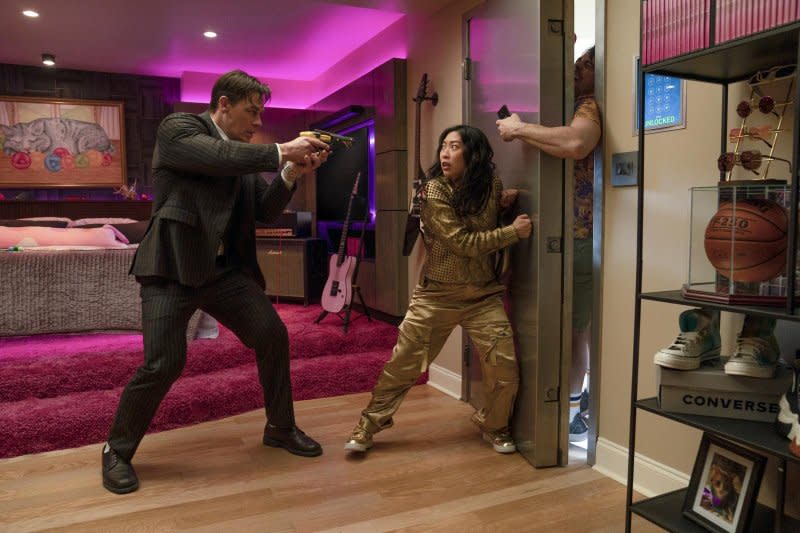 John Cena (L) and Awkwafina star in the action comedy "Jackpot!" Photo courtesy of Prime Video