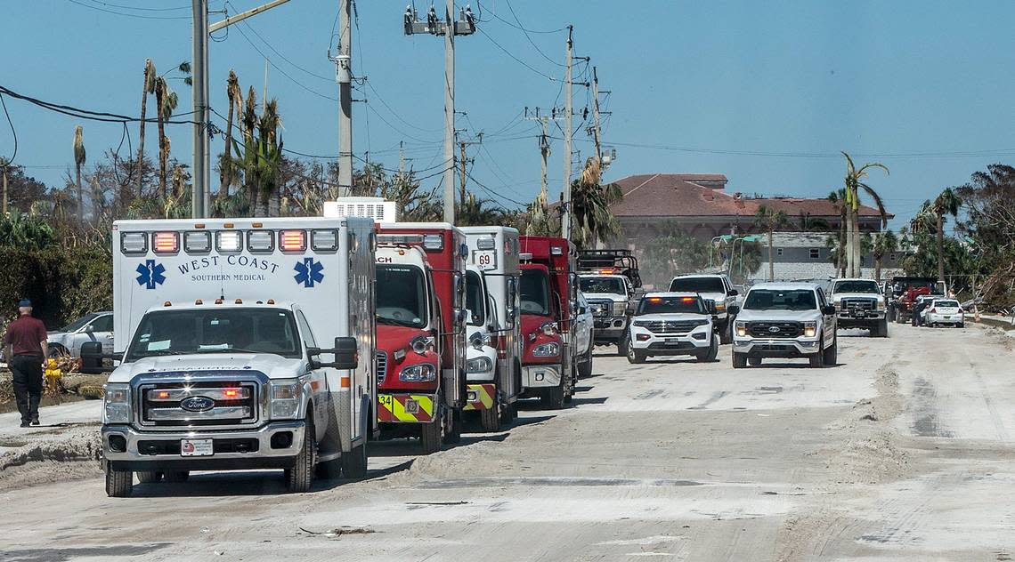 A convoy of Paramedics and Fire Rescue vehicles arrive in Fort Myers Beach two days after Hurricane Ian hit Florida’s west coast as a Category 4 storm, on Friday September 30, 2022.