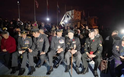 Veterans during the ceremony at Pegasus Bridge in Normandy - Credit: Owen Humphreys/PA