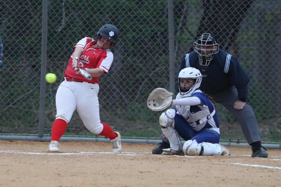 North Rockland's Kristen Luzon (22) rips a triple during the Red Raiders' softball game against Mahopac at North Rockland High School on April 18, 2022.
