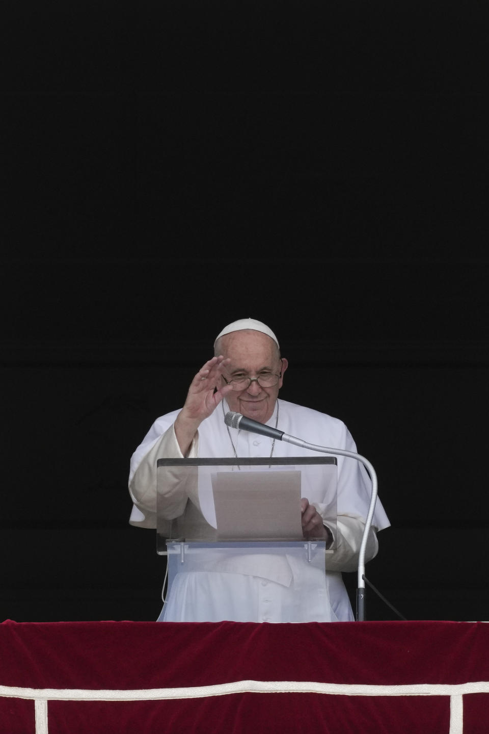 Pope Francis delivers his blessing as he recites the Angelus noon prayer from the window of his studio overlooking St.Peter's Square, at the Vatican, Sunday, Sept. 11, 2022. (AP Photo/Andrew Medichini)