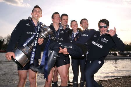 Rowing - BNY Mellon 2015 Oxford v Cambridge University Boat Race - River Thames, London - 11/4/15 Oxford crew members celebrate winning the Boat Race Action Images via Reuters / Paul Childs