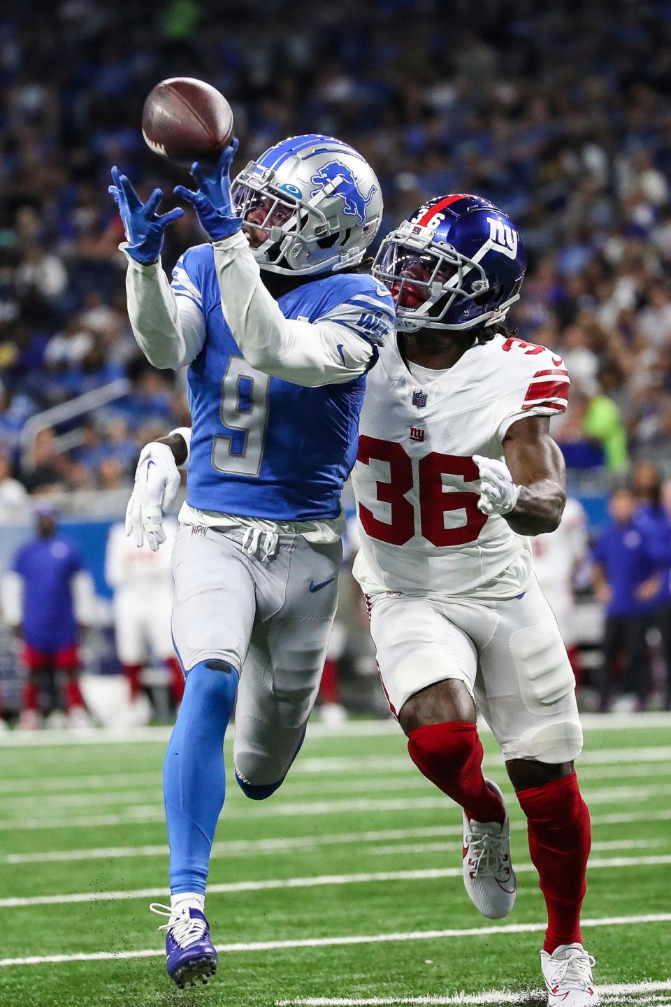 Detroit Lions wide receiver Jameson Williams (9) tries to make a catch against New York Giants cornerback Deonte Banks (36) during the first half of a preseason game at Ford Field in Detroit on Friday, Aug. 11, 2023.