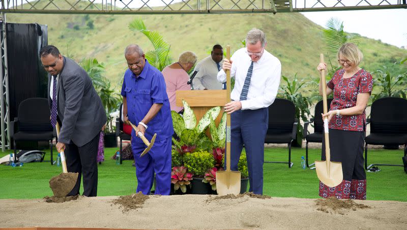 Elder Peter F. Meurs, center left, and Sister Maxine Meurs join with His Excellency, Sir Bob Dadae, governor general of Papua New Guinea, and Tauvasa Tanuvasa Chou-Lee, solicitor general, to break ground for the Port Moresby Temple on April 22, 2023.