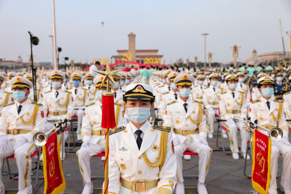 China's military orchestra sit in Tiananmen Square.