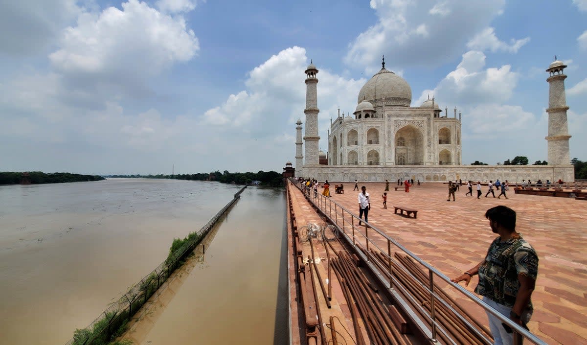 The swollen Yamuna rises to the periphery of the Taj Mahal, the first time in 45 years in Agra on 19 July (AP)