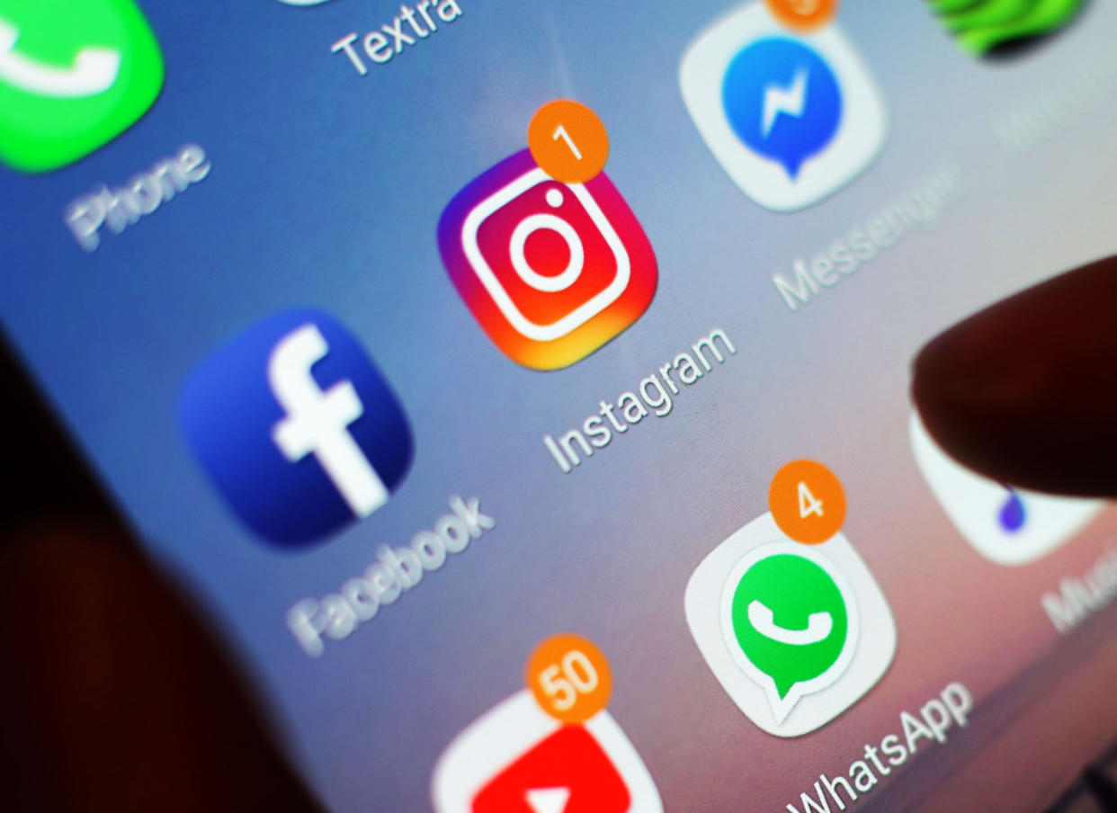 Undated file photo of the Instagram icon displayed on a mobile phone screen. Instagram has begun hiding likes and video views as part of a trial aimed at removing "the pressure" and shifting the focus to "sharing the things" its users enjoy.