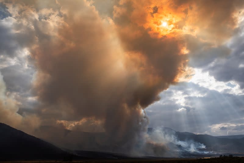 Smoke rises from the Brattain Fire in the Fremont National Forest in Paisley, Oregon