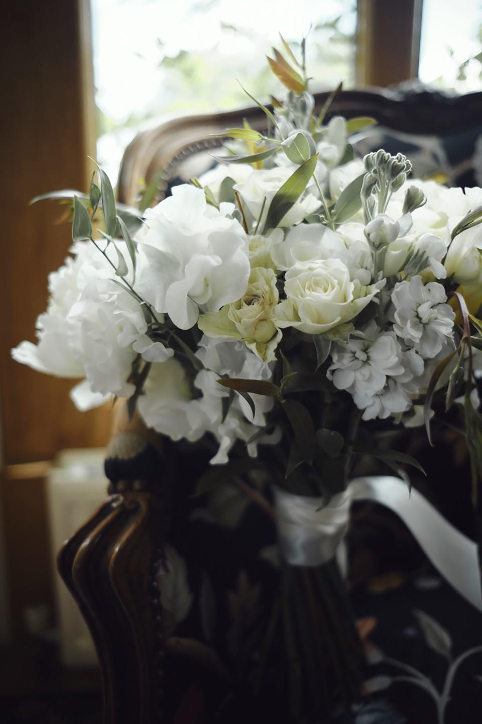 My wedding bouquet using English summer flowers, and I had fresh yellow roses from the garden in my hair.