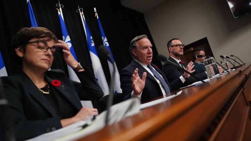 In March, Premier François Legault said Quebec had done enough to help asylum seekers when the federal program was first announced. A spokesperson for the Immigration Minister Christine Fréchette, left, says that position remains unchanged. 