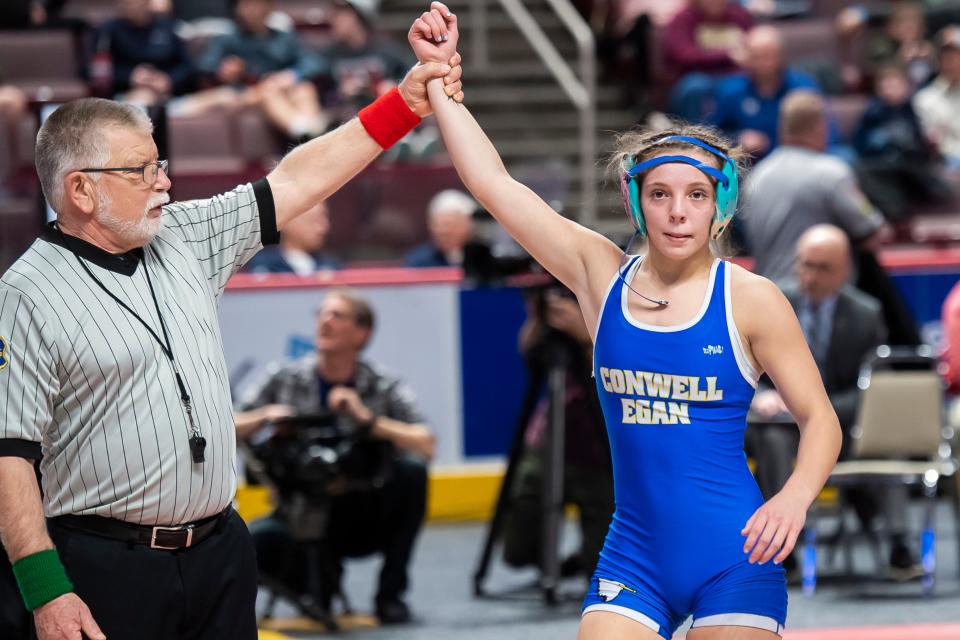 Conwell-Egan's Julia Horger wins gold in the 106-pound championship bout at the PIAA Girls' Wrestling Championships at the Giant Center on March 9, 2024, in Hershey. Horger won by decision, 9-3.