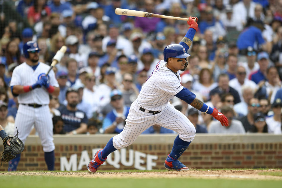 Chicago Cubs' Javier Baez hits a single during the sixth inning of a baseball game against the Milwaukee Brewers, Saturday, Aug 31, 2019, in Chicago. Milwaukee won 2-0. (AP Photo/Paul Beaty)