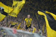 Dortmund's fans cheer for their team during the Champions League semifinal first leg soccer match between Borussia Dortmund and Paris Saint-Germain at the Signal-Iduna Park in Dortmund, Germany, Wednesday, May 1, 2024. (AP Photo/Martin Meissner)
