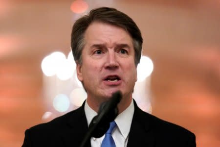 FILE PHOTO: U.S. Supreme Court Associate Justice Brett Kavanaugh speaks during his ceremonial public swearing-in, in the East Room of the White House in Washington, U.S., October 8, 2018.  REUTERS/Jonathan Ernst