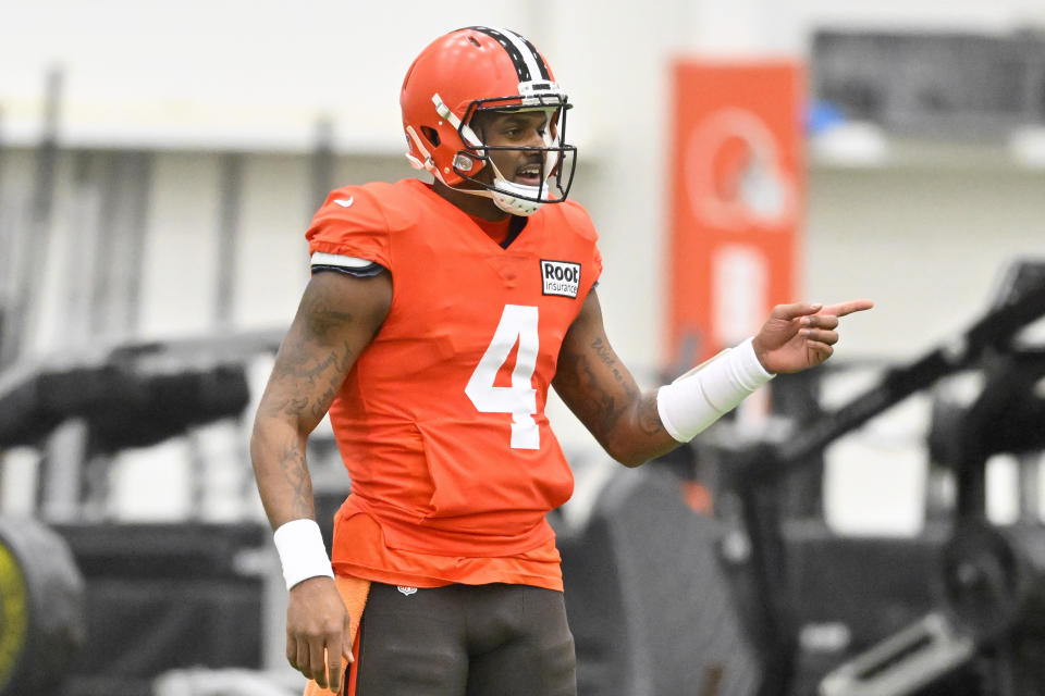 Cleveland Browns quarterback Deshaun Watson stands on the field during an NFL football practice at the team's training facility Wednesday, Nov. 30, 2022, in Berea, Ohio. (AP Photo/David Richard)