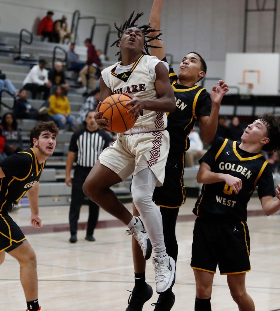 Tulare Union's Brayden Stevenson drives against Golden West's during their 72nd annual Polly Wilhelmsen Invitational Basketball Tournament game in Visalia, Calif., Wednesday, Dec. 27, 2023.