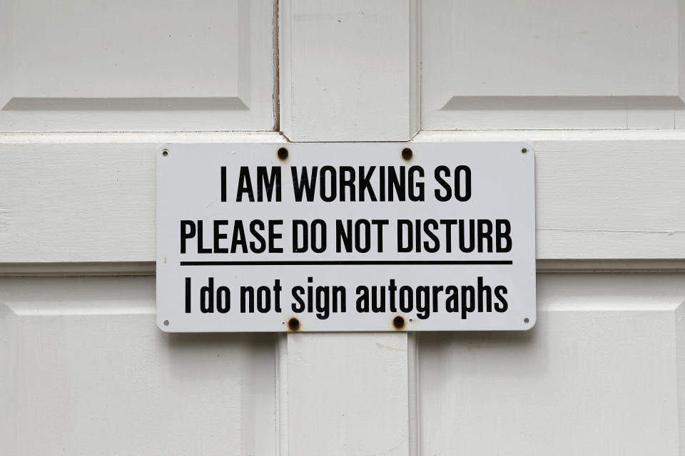 A sign on door bids visitors to not disturb is seen during a preview tour of the home and studio of artist Andrew Wyeth Monday, April 23, 2012 in Chadd's Ford, Pa. The studio will be open for tours in the summer of 2012 by the Brandywine River Museum. (AP Photo/Alex Brandon)