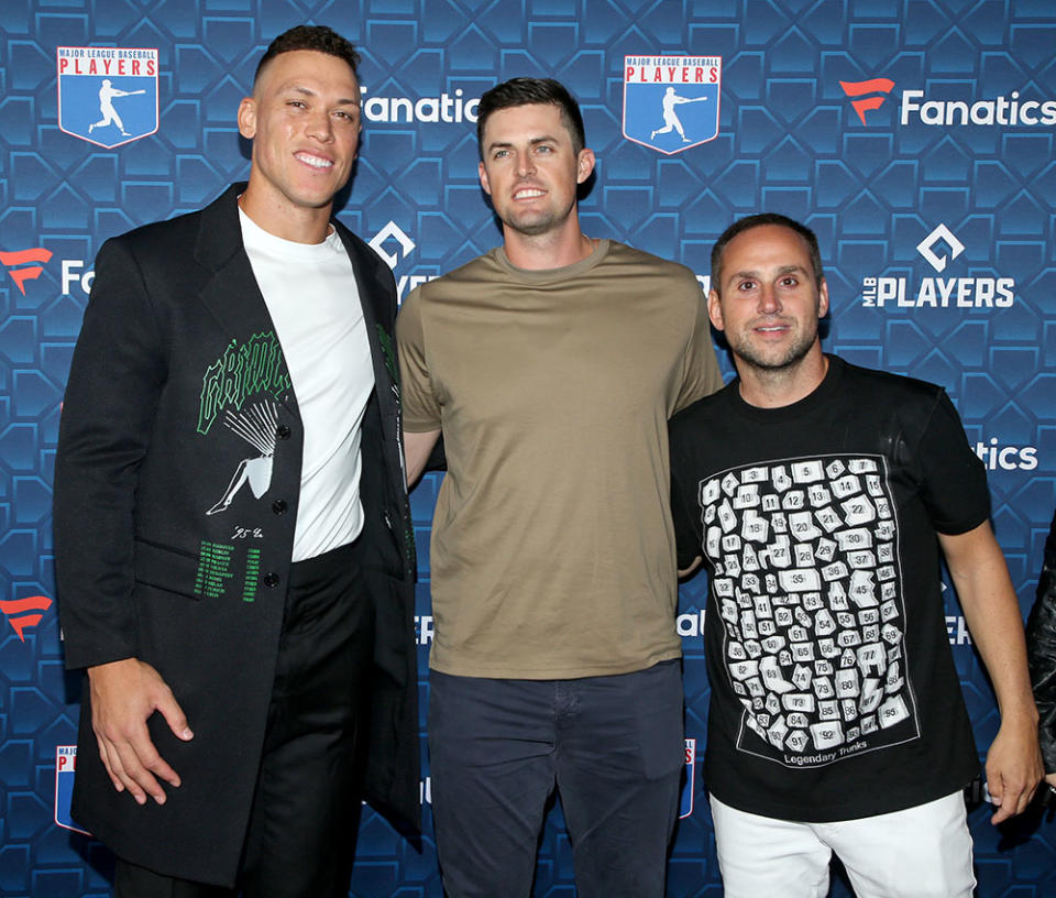 Aaron Judge, Clay Holmes and Fanatics CEO Michael Rubin - Credit: Phillip Faraone/Getty Images