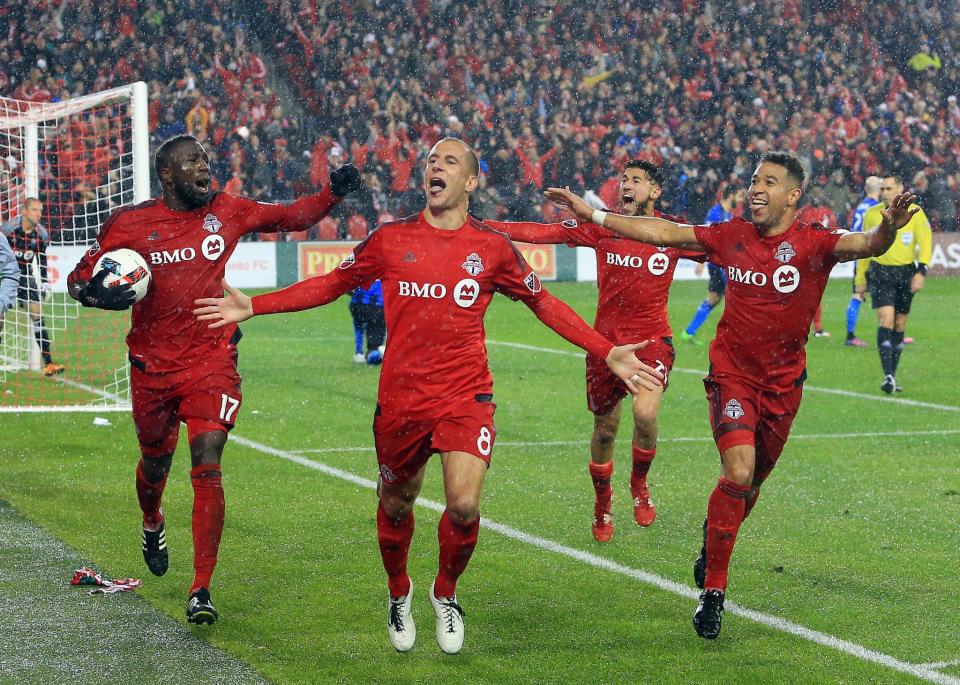 <p>Benoit Cheyrou #8 of Toronto FC celebrates a goal with teammates during the second half of the MLS Eastern Conference Final, Leg 2 game against Montreal Impact at BMO Field on November 30, 2016 in Toronto, Ontario, Canada. (Photo by Vaughn Ridley/Getty Images) </p>