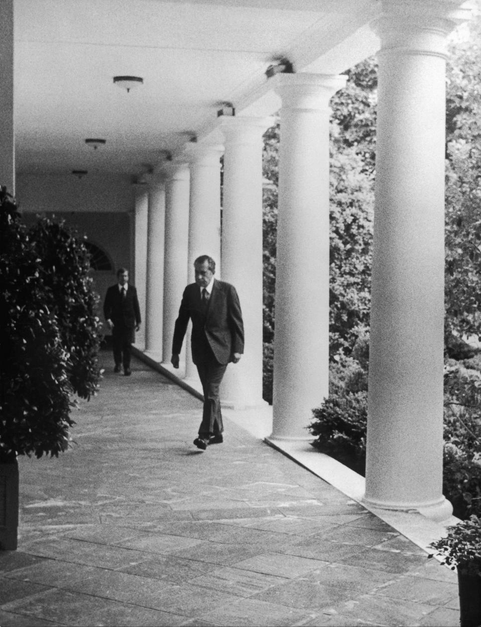 UNITED STATES - MARCH 09:  President Richard Nixon Walking Through The Rose Garden At The White House In Washington On August 8, 1974, Before The Televised Announcement Of His Resignation, After Having Been Charged Because Of The Watergate Scandal.  (Photo by Keystone-France/Gamma-Keystone via Getty Images)