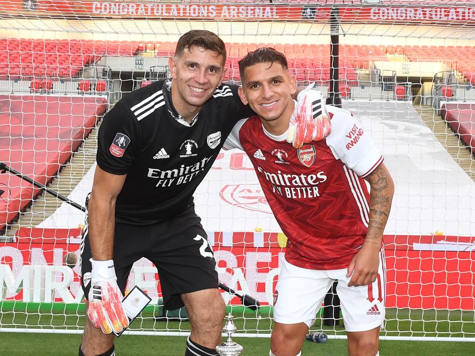 Martinez celebrates with Lucas Torreira after the FA Cup finalGetty