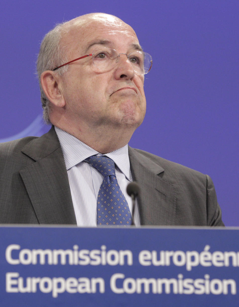 European Commissioner for Competition Joaquin Almunia addresses the media at the European Commission headquarters in Brussels, Tuesday, April 29, 2014. The European Commission says Motorola Mobility, which Google is selling to China’s Lenovo, has abused its market position in Europe by refusing to grant crucial technology licenses to rival Apple, then suing Apple for infringement. (AP Photo/Yves Logghe)